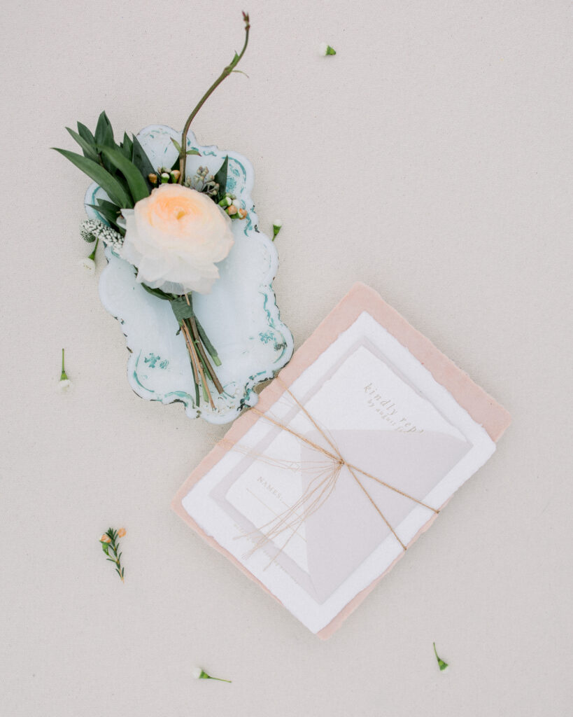 pink boutonnière in a vintage china dish and rsvp card, wedding day details by Boston wedding photographer Ashley Helen